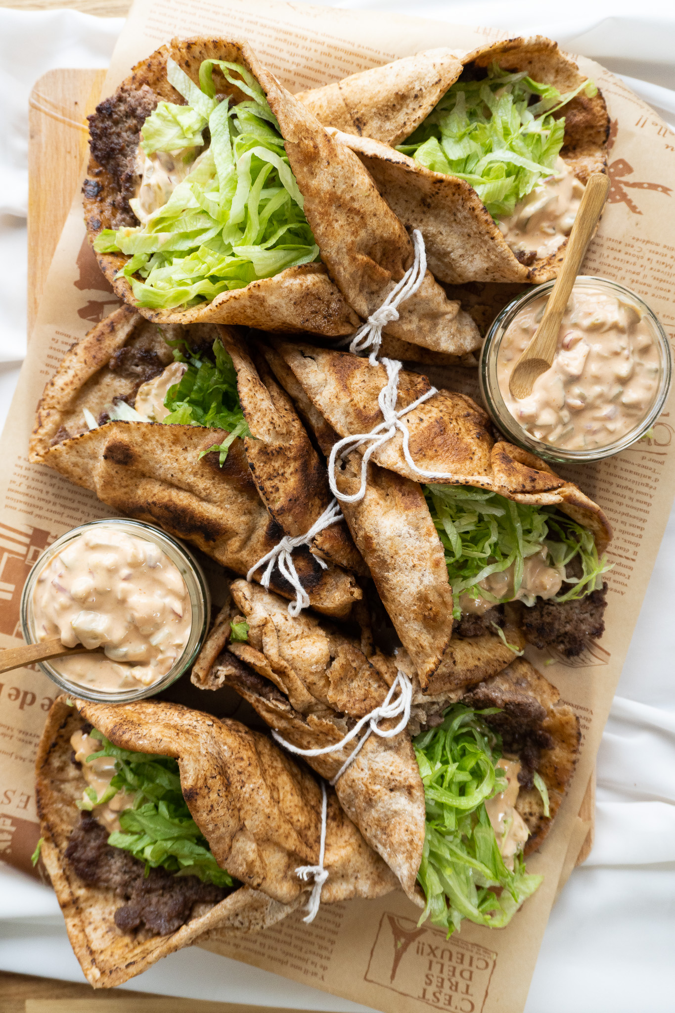 A platter of lazy smash burger wrap ready to be served to guests while hot